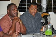 Ministers Donville Inniss and Chris Sinckler
